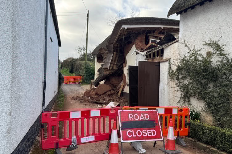 The road closure in place in Pump Street, Newton St Cyres, after the property collapse.  AQ 6370
