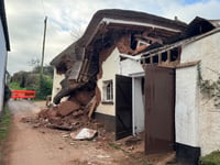 Cottage collapse results in road closure
