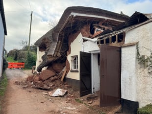 Cottage collapse results in road closure
