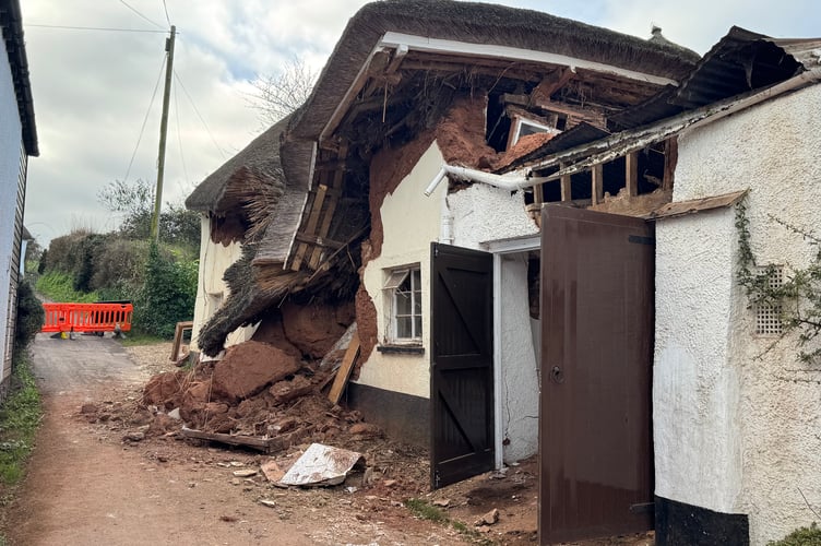 The collapsed property in Newton St Cyres which has resulted in the closure of Pump Street.  AQ 6373

