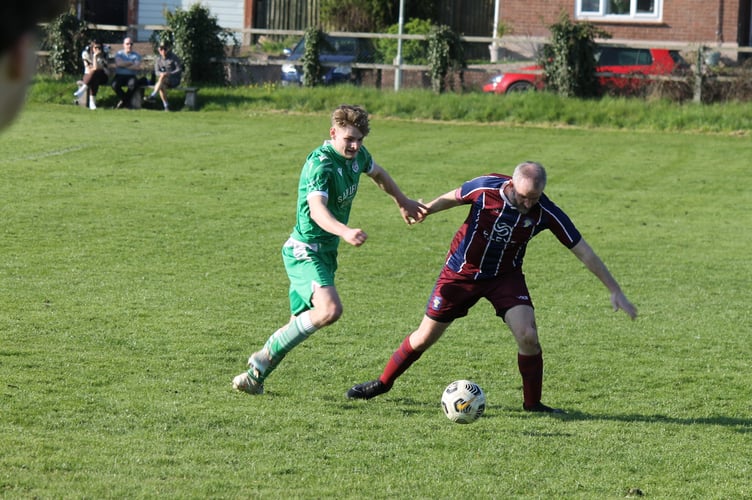 A battle for the ball.  AQ 1156
