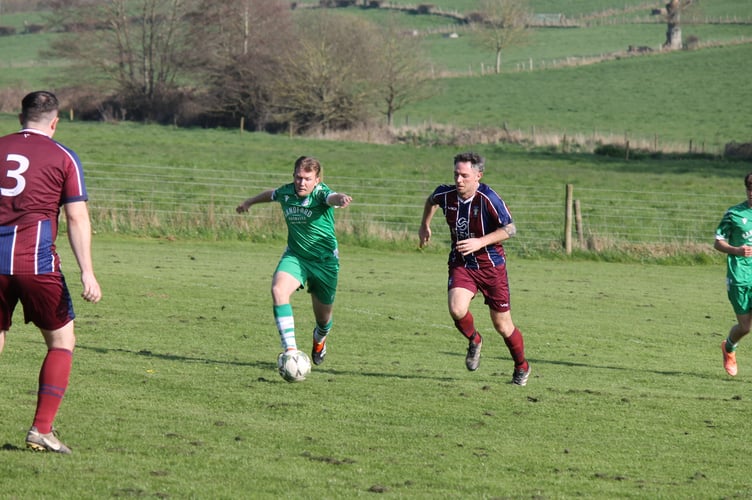 Matt Baker for Sandford before he scored the third goal against Tedburn St Mary.  AQ 1125
