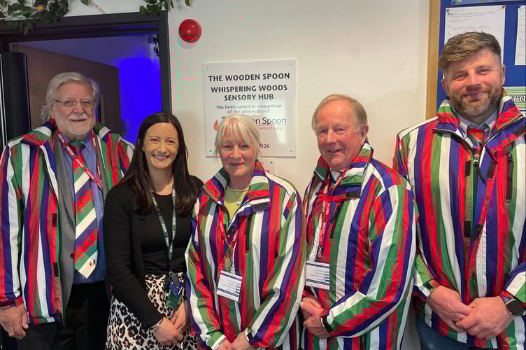 Wooden Spoon representatives with Head of School Claire Theedom, second from left