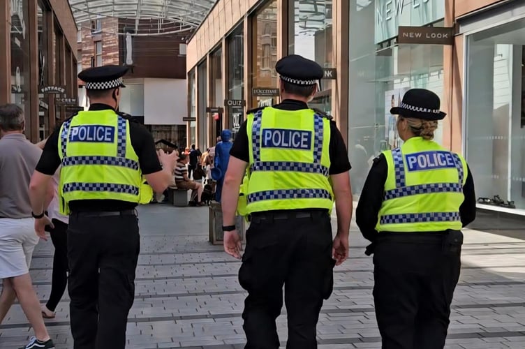 Police Officers on duty in Exeter.
