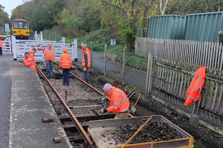 Replacing old sleepers on the heritage rail line at Torrington