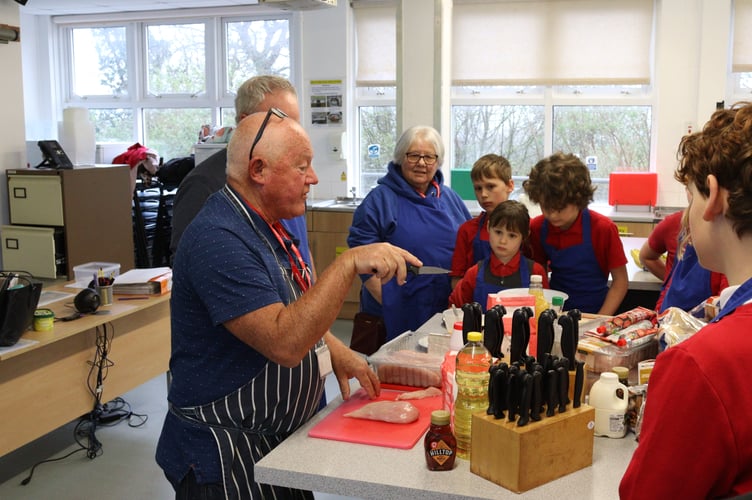 Local councillor and restaurateur Jim Cairney demonstrating how to make chicken goujons