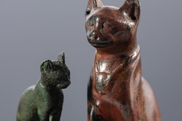 Egyptian cat statues are among Charlie and Shirley Watts' collection.