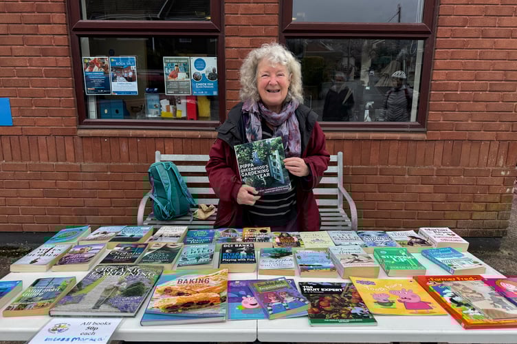 During a recent Friends of Crediton Library book sale of donated second hand books. AQ 5791