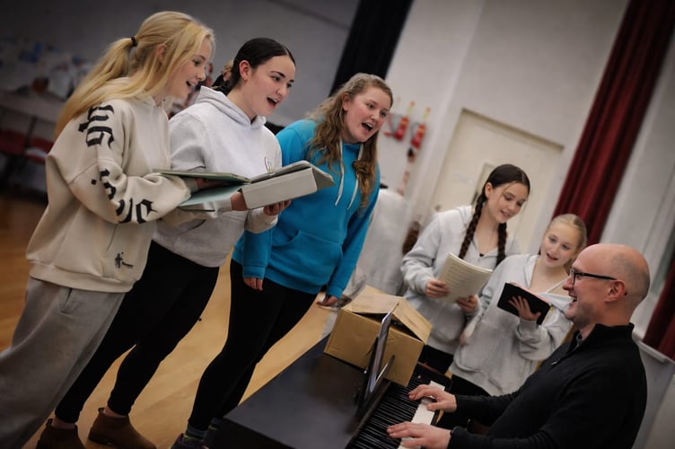 Rehearsing singing parts for CODS performances of Joseph and the Amazing Technicolor Dreamcoat.