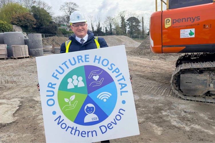 North Devon MP Ian Roome at the construction site for the new NDDH hospital residences