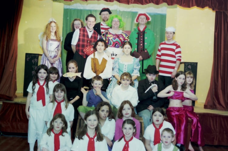 The cast of Cheriton Fitzpaine Drama Group's pantomime 'Dick Whittington' in January 2005. DSC00212