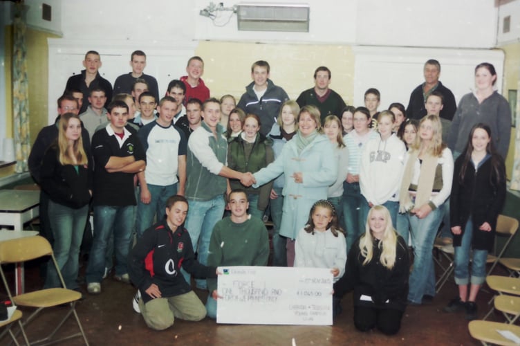 Tedburn and Cheriton YFC presented a cheque for more than £1,000 to FORCE cancer charity in November 2005. DSC01900