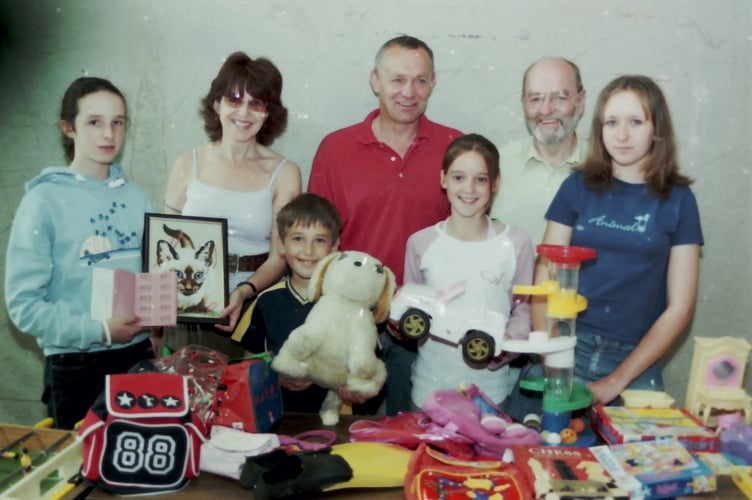 Behind one of the stalls at Beacon Church fete in June 2005. DSC00113