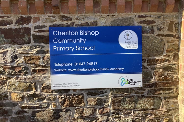 Cheriton Bishop Community Primary School sign.
