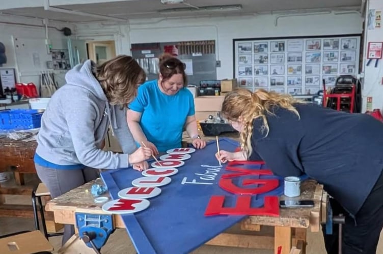 Painting sections of the set for Joseph and the Amazing Technicolour Dreamcoat.
