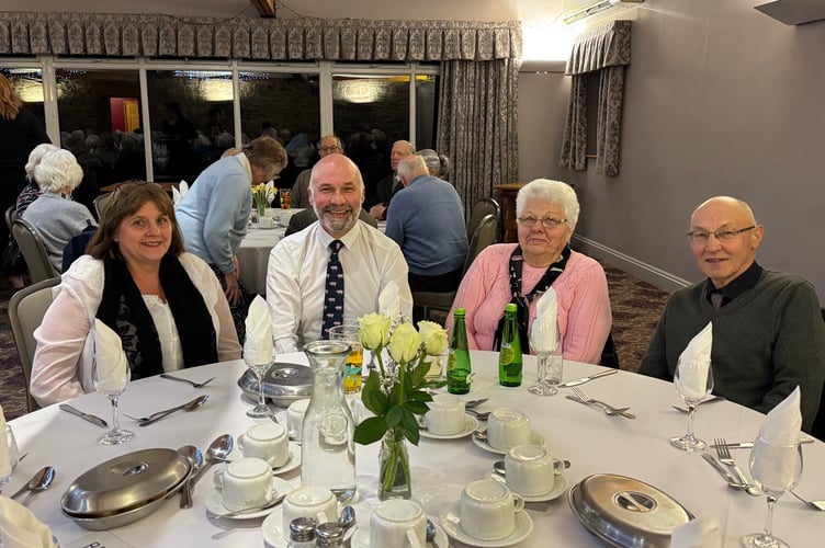 Sarah Chown with Dan Downes and his parents at the anniversary dinner. AQ 6863