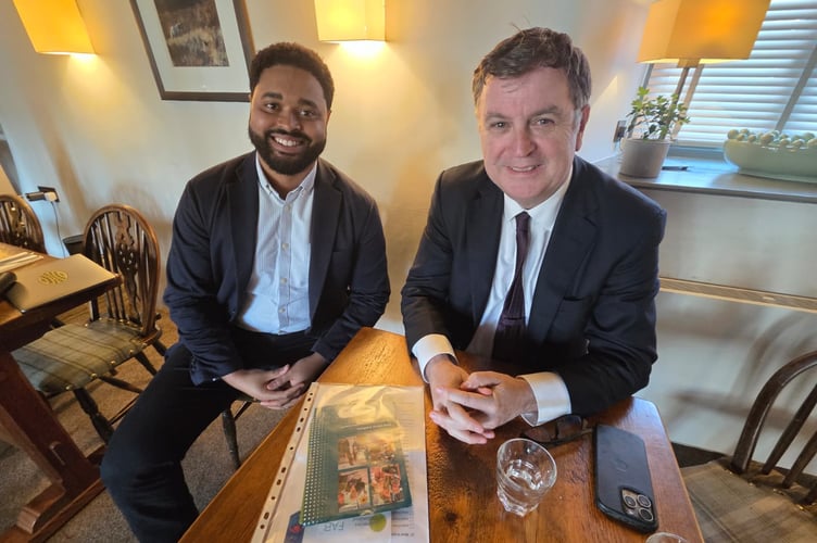 Sir Mel Stride, Central Devon MP, right, with Solomon Elliott from Save Devon’s Libraries.