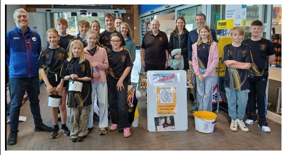 Crediton Swimming Club member bag packing at Crediton Tesco.
