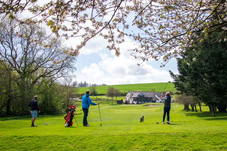 Completing the round on Saturday, April 11, the 19th hole in sight.