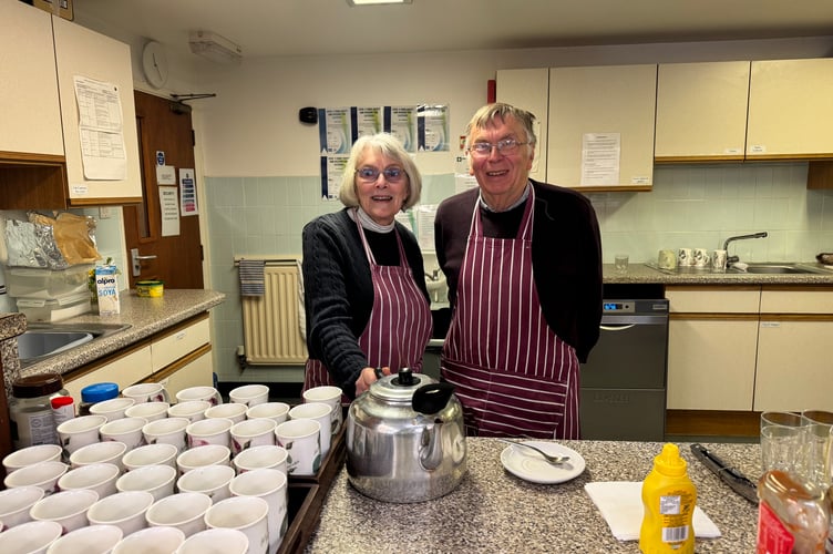 Mandi and Nigel served the refreshments. AQ 8122
