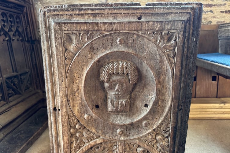 John the Baptist’s Head on a Plate on one of the historic carved pew ends at Coldridge.  AQ 6575
