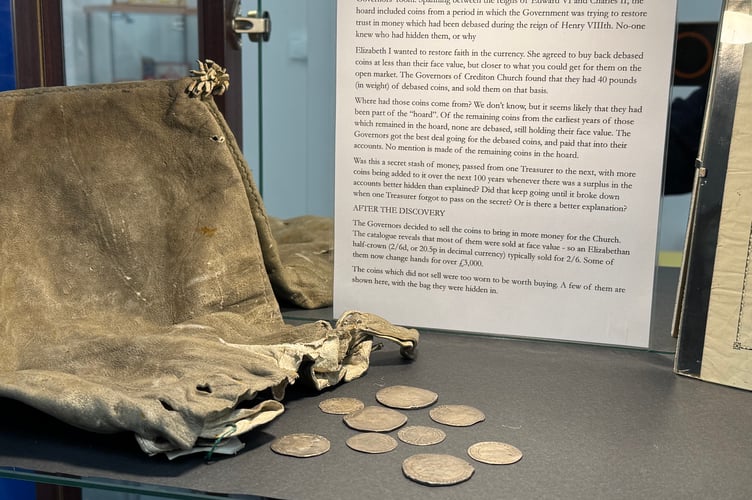 Some of the silver coins from the Crediton hoard are on display in the museum exhibition.  AQ 8140
