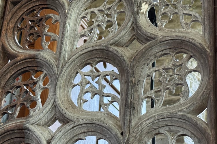 Part of the historic screen carved by Breton crafts folk.  AQ 6545
