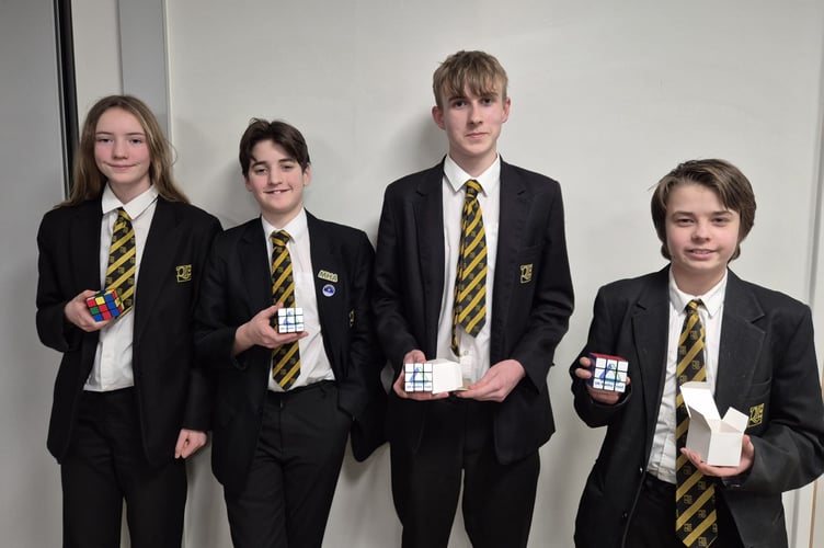 The QE maths team celebrate their runner-up finish in the Team Maths Challenge.