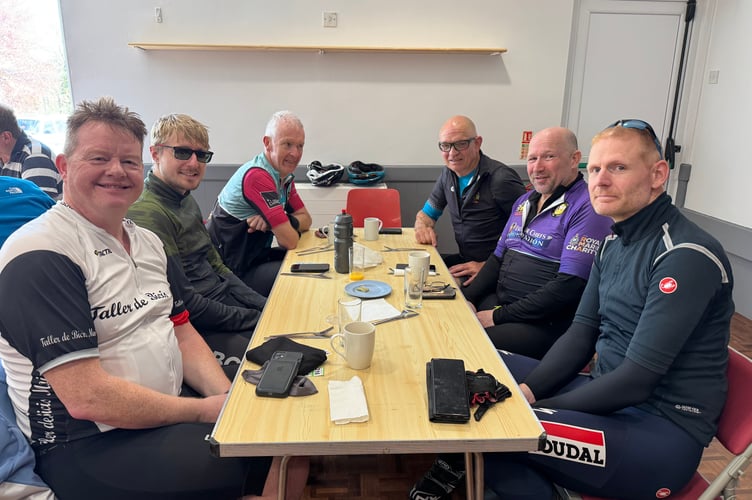 A group from Exeter Chiefs Cycling Club cycle to the YFC Big Breakfast each year, here pictured awaiting their breakfasts. AQ 8598