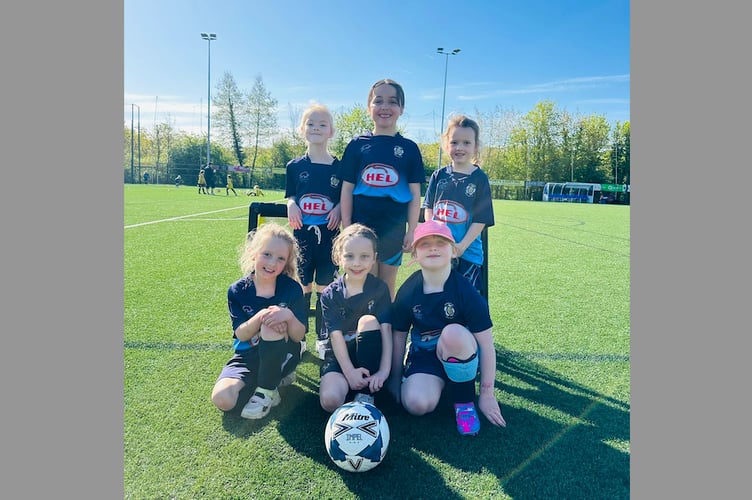 Crediton Youth U7 girls on their first football experience.
