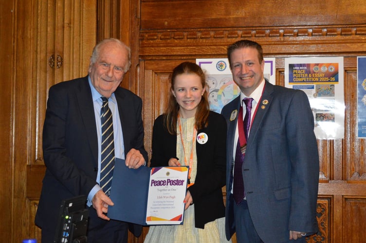 Lilah, from Crediton, centre, received prizes after winning the National Lions Peace Poster competition.
