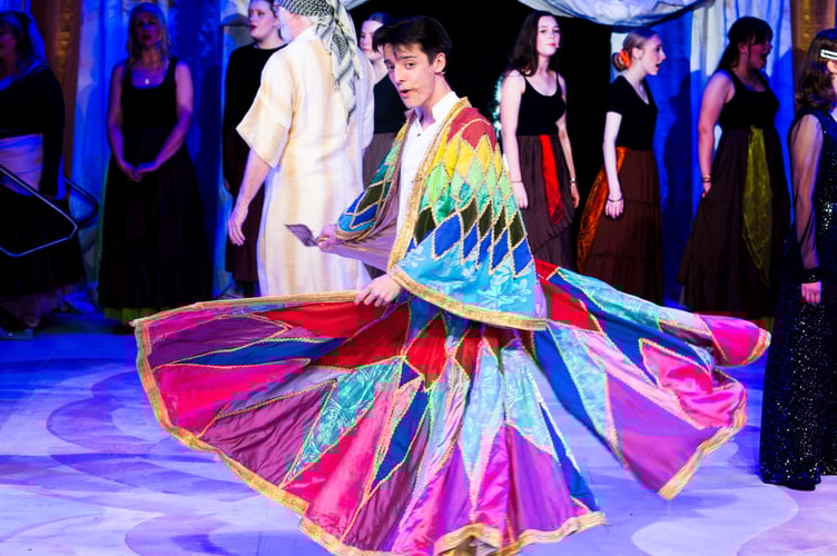 Joseph with his amazing technicolour dreamcoat.  Oliver Photography 
