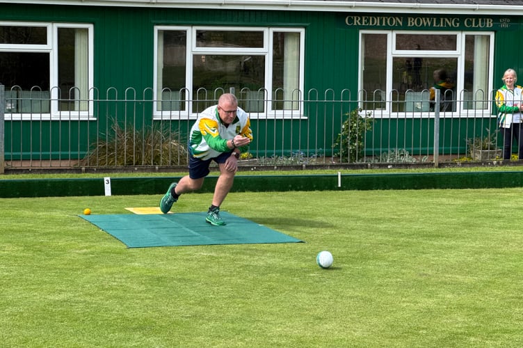 Rob Paxton bowling the first wood of the season at Crediton Bowling Club.  AQ 8492

