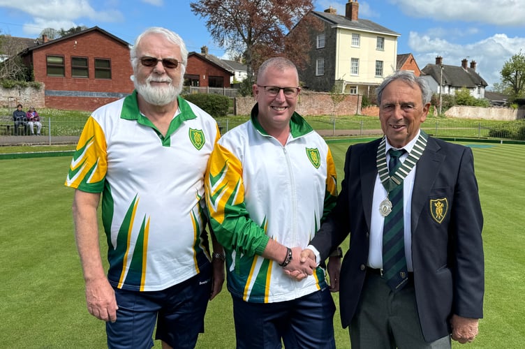 Rob Paxton, centre, was thanked for bowling the first wood at Crediton by club president Stephen Wollacott, pictured with club chairman, Mike Canning, left.  AQ 8496
