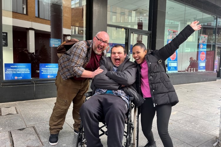 Community Equality Disability Action (CEDA) members celebrate £5,000 from The Cadbury Foundation.
