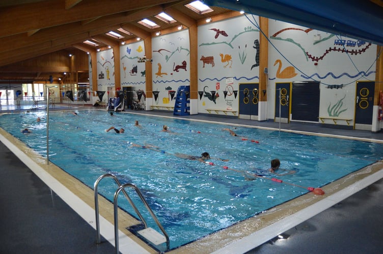 Swimming was the first activity for the triathletes.
