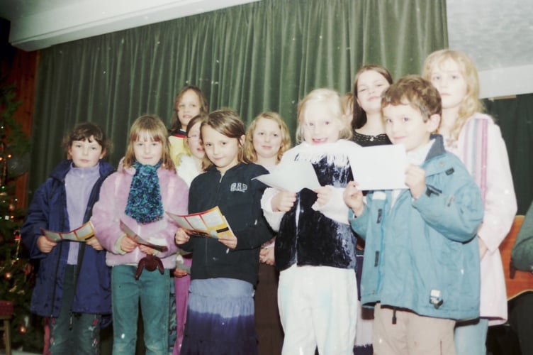 Children from Morchard Bishop Primary School who sang at the village church bazaar in December 2005. DSC00254