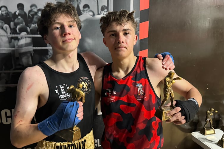 Two competitors after their bout.  AQ 9492
