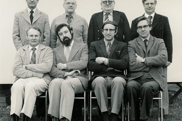Ron, seated left, with his colleagues at The Met Office, Bracknell.