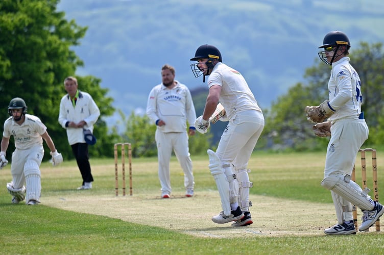 Devon Cricket League C Division East. Teignmouth and Shaldon 1st XI versus Sandford 2nd XI. T&S batsman Alastair Cliffe shouts hold to team mate Todd Ballman