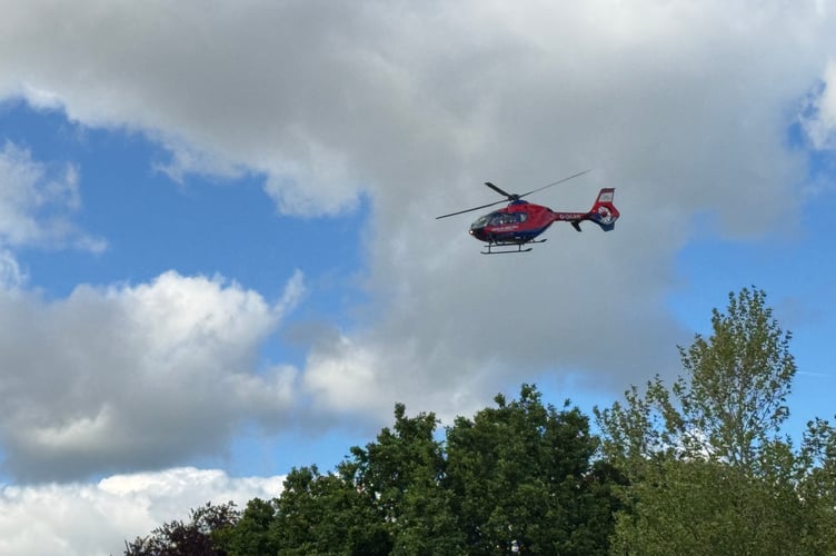 The air ambulance leaving Newcombes Meadow at 5.17pm.  AQ 0546
