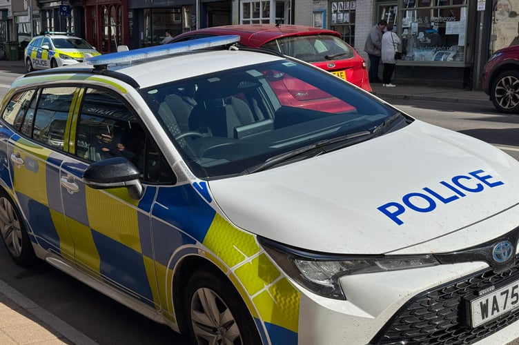 Police cars in Crediton High Street.  AQ 0542

