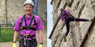 Bishop abseils down Exeter Cathedral