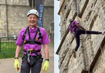 Bishop abseils down Exeter Cathedral