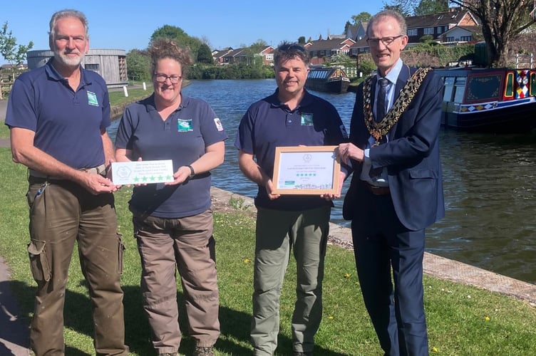 (Left to right) Canal Rangers Craig Saunderson and Jo Roberts, Canal Country Park Manager Mark Baker and Mayor of Tiverton Cllr Neal Davey.
