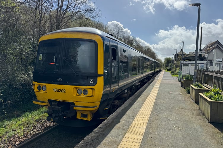 A train at Copplestone Railway Station. AQ 8112