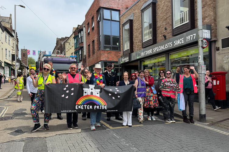 The front of the Exeter Pride March making its way down Fore Street in Exeter.  AQ 0137