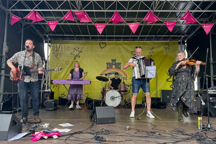 Folk performers led ceilidh dancing at Exeter Pride.  AQ 0340
