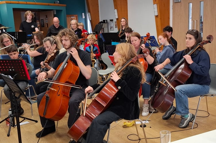 Parents and returning past members joined the Orchestra for some of the concert.