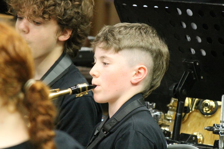 A young saxophonist with Crediton Youth Orchestra. AQ 1288